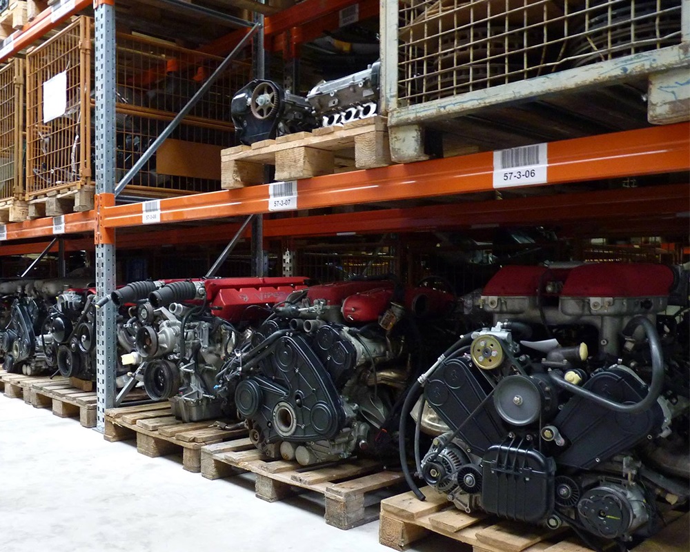 Organized warehouse shelving stocked with automotive parts